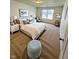 Calm bedroom features a large bed, decorative pillows, bedside tables and ample natural light at 5313 Brandywine Dr, Whitestown, IN 46075