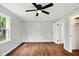 Bright bedroom with hardwood floors and a closet off to the side at 532 W 1050 N, Fortville, IN 46040