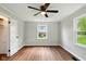 Inviting bedroom featuring natural light and hardwood flooring at 532 W 1050 N, Fortville, IN 46040