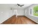 Open-concept living room with great natural light, hardwood floors, and easy access to other areas at 532 W 1050 N, Fortville, IN 46040