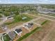 A beautiful aerial view of the new homes and the surrounding lush green landscapes and neighborhood at 558 Plowman Dr, Shelbyville, IN 46176