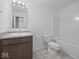 Standard bathroom features a single sink vanity and a combined shower and tub at 558 Plowman Dr, Shelbyville, IN 46176