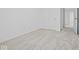 A small bedroom features soft carpeting and a bi-fold closet, ready to be styled at 558 Plowman Dr, Shelbyville, IN 46176