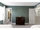 Neutral bedroom featuring a dresser, closet, and neutral color palette with soft carpet at 5593 Ralfe Rd, Indianapolis, IN 46234