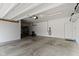 Spacious garage with ample storage and a convenient electric vehicle charging outlet at 5593 Ralfe Rd, Indianapolis, IN 46234