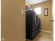 Functional laundry room with modern appliances and ample space at 5593 Ralfe Rd, Indianapolis, IN 46234