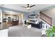 Open-concept living room blends seamlessly with the kitchen and dining area for easy entertaining at 5593 Ralfe Rd, Indianapolis, IN 46234