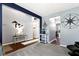 Cozy living room with neutral color scheme, hardwood floors, and stylish decor at 5593 Ralfe Rd, Indianapolis, IN 46234