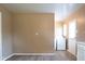 Functional laundry room with ample space and convenient access to the exterior at 5605 Glencoe St, Indianapolis, IN 46226