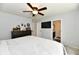 Bedroom features include a ceiling fan, natural light, and en suite bathroom at 5611 Burning Tree Ct, Indianapolis, IN 46239