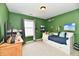 Bright bedroom with playful decor, a comfortable bed, and natural light at 5611 Burning Tree Ct, Indianapolis, IN 46239
