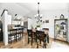 Open concept dining area with kitchen view, ideal for Gathering gatherings and everyday living at 5611 Burning Tree Ct, Indianapolis, IN 46239