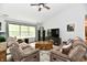 Inviting living room with comfortable seating and lots of natural light at 5611 Burning Tree Ct, Indianapolis, IN 46239