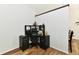 Functional home office with black desk and chair, perfect for remote work at 5611 Burning Tree Ct, Indianapolis, IN 46239