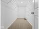 Well-organized walk-in closet with installed shelving offers convenience at 564 Plowman Dr, Shelbyville, IN 46176