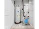 A utility room featuring water heater, furnace, and air conditioning unit at 564 Plowman Dr, Shelbyville, IN 46176
