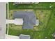 Aerial view of the backyard featuring a patio and well-maintained lawn, showcasing the property's outdoor space at 5667 Skylark Dr, Greenwood, IN 46143