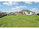 Well-maintained backyard with a covered patio and fire pit, offering a perfect space for outdoor activities and relaxation at 5667 Skylark Dr, Greenwood, IN 46143