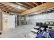 Unfinished basement featuring exposed beams, visible utilities, and ample space for customization at 5667 Skylark Dr, Greenwood, IN 46143
