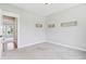 Empty bedroom ready for personalization with fresh paint and plush carpet at 5667 Skylark Dr, Greenwood, IN 46143