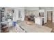 Eat-in kitchen featuring a large island, stainless steel appliances, hardwood floors and access to the patio at 5667 Skylark Dr, Greenwood, IN 46143