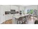 Modern kitchen with white cabinetry, stainless steel appliances, and a center island at 5667 Skylark Dr, Greenwood, IN 46143