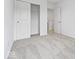 Cozy bedroom with plush carpeting, neutral walls, and a closet with sliding doors, offering comfort and style at 576 Plowman Dr, Shelbyville, IN 46176