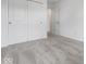 Bedroom with neutral color walls, soft carpeting, and a closet, providing a comfortable and inviting space at 576 Plowman Dr, Shelbyville, IN 46176