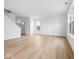 Spacious living room featuring hardwood floors and plenty of natural light at 576 Plowman Dr, Shelbyville, IN 46176