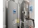 Utility closet featuring a hot water heater, HVAC unit, and all the essential utilities at 576 Plowman Dr, Shelbyville, IN 46176