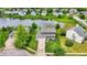 Beautiful two-story home with a three-car garage overlooking the lake at 6624 Lakestone Ct, Indianapolis, IN 46237
