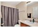 A neutral bathroom featuring a shower and sink at 6624 Lakestone Ct, Indianapolis, IN 46237