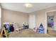 A spacious room perfect for a playroom at 6624 Lakestone Ct, Indianapolis, IN 46237