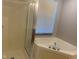 Well-equipped bathroom with a separate shower and soaking tub, offering a spa-like experience at 6625 Wolverine Way, Indianapolis, IN 46237