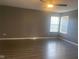 Spacious bedroom features updated flooring and neutral paint, creating a bright, inviting space at 6625 Wolverine Way, Indianapolis, IN 46237