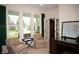 Bright office with large windows, comfortable seating, and a classic writing desk at 665 Featherstone Dr, Westfield, IN 46074