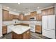 Well-lit kitchen with stainless steel appliances, an island, and ample cabinet space at 6816 Park Square Dr # C, Avon, IN 46123