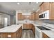 Modern kitchen featuring stainless steel appliances, countertop space, and center island at 6816 Park Square Dr # C, Avon, IN 46123