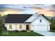 Charming one-story home with modern siding, shutters, and a well-manicured lawn at 700 North W, McCordsville, IN 46055