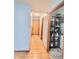 Hallway with natural wood trim and doors leading to other rooms, showcasing the home's layout at 7109 Chandler Dr, Indianapolis, IN 46217
