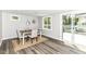 Cozy dining room with natural light and a view to the outside at 7118 Mikesell Dr, Indianapolis, IN 46260