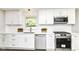 Modern kitchen with white cabinets, stainless steel appliances, and quartz countertops at 7118 Mikesell Dr, Indianapolis, IN 46260