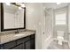 Bathroom vanity with granite countertops paired with a tub and toilet offering a functional space at 7614 Bishops, Zionsville, IN 46077