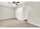 Bedroom featuring neutral carpeting, ceiling fan, and double closets at 7614 Bishops, Zionsville, IN 46077