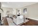 Inviting living room featuring hardwood floors and neutral decor at 7614 Bishops, Zionsville, IN 46077