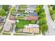 Aerial view of multiple backyards in a neighborhood, showcasing green lawns and lush trees at 767 Fletcher Ave, Indianapolis, IN 46203