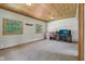 Bonus room featuring wood ceiling, carpet, natural light, and workspace at 775 Baker Rd, Martinsville, IN 46151