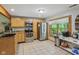 Bright kitchen with stainless steel appliances, light wood cabinetry, and a view of the outdoors at 775 Baker Rd, Martinsville, IN 46151