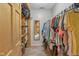 Spacious walk-in closet with custom shelving and ample storage for clothes and accessories at 775 Baker Rd, Martinsville, IN 46151