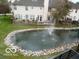 Backyard with view of pond at 8002 Windham Lake Way # 33, Indianapolis, IN 46214